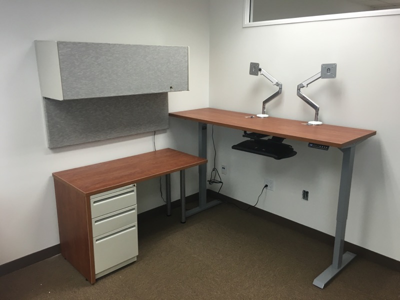 Cubicle with a standing desk